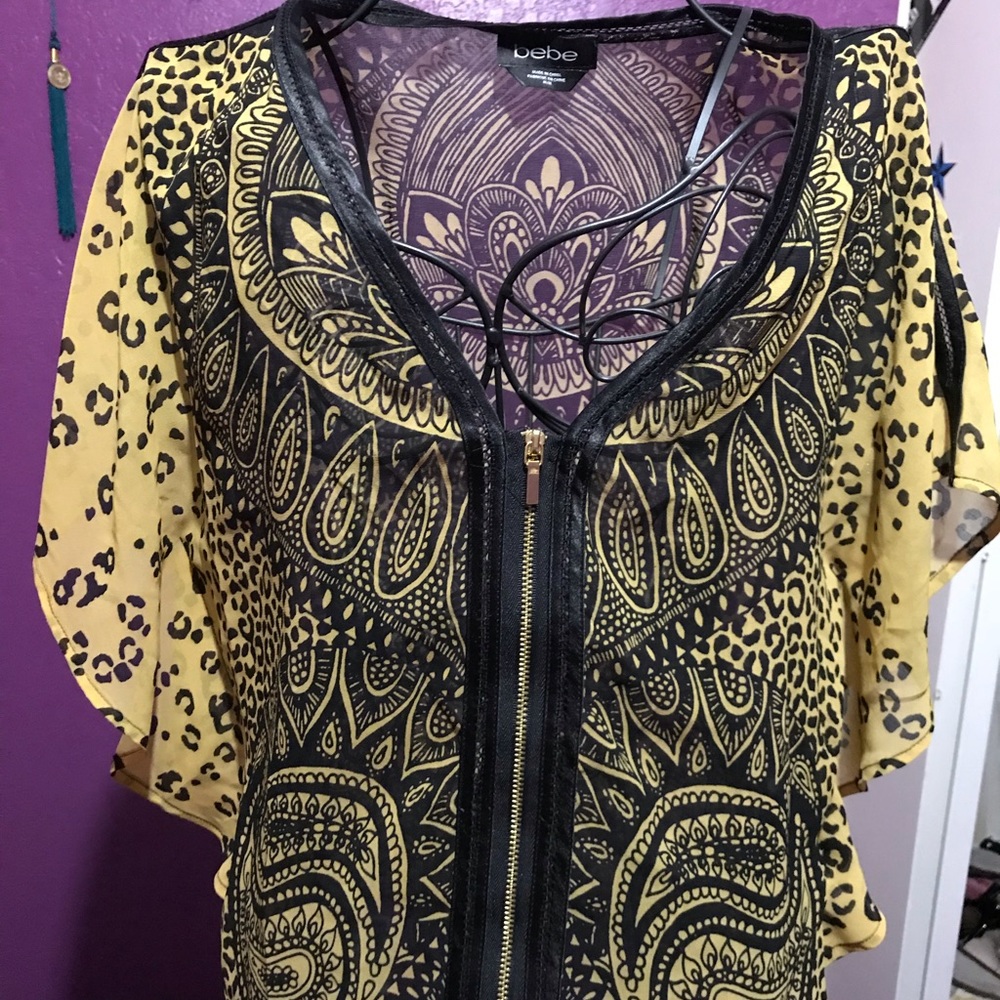 Bebe chiffon leopard print top.